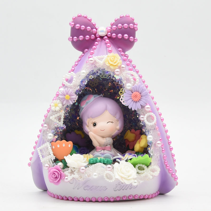 Decorative figurine with a character inside, surrounded by flowers and a large bow on a white background