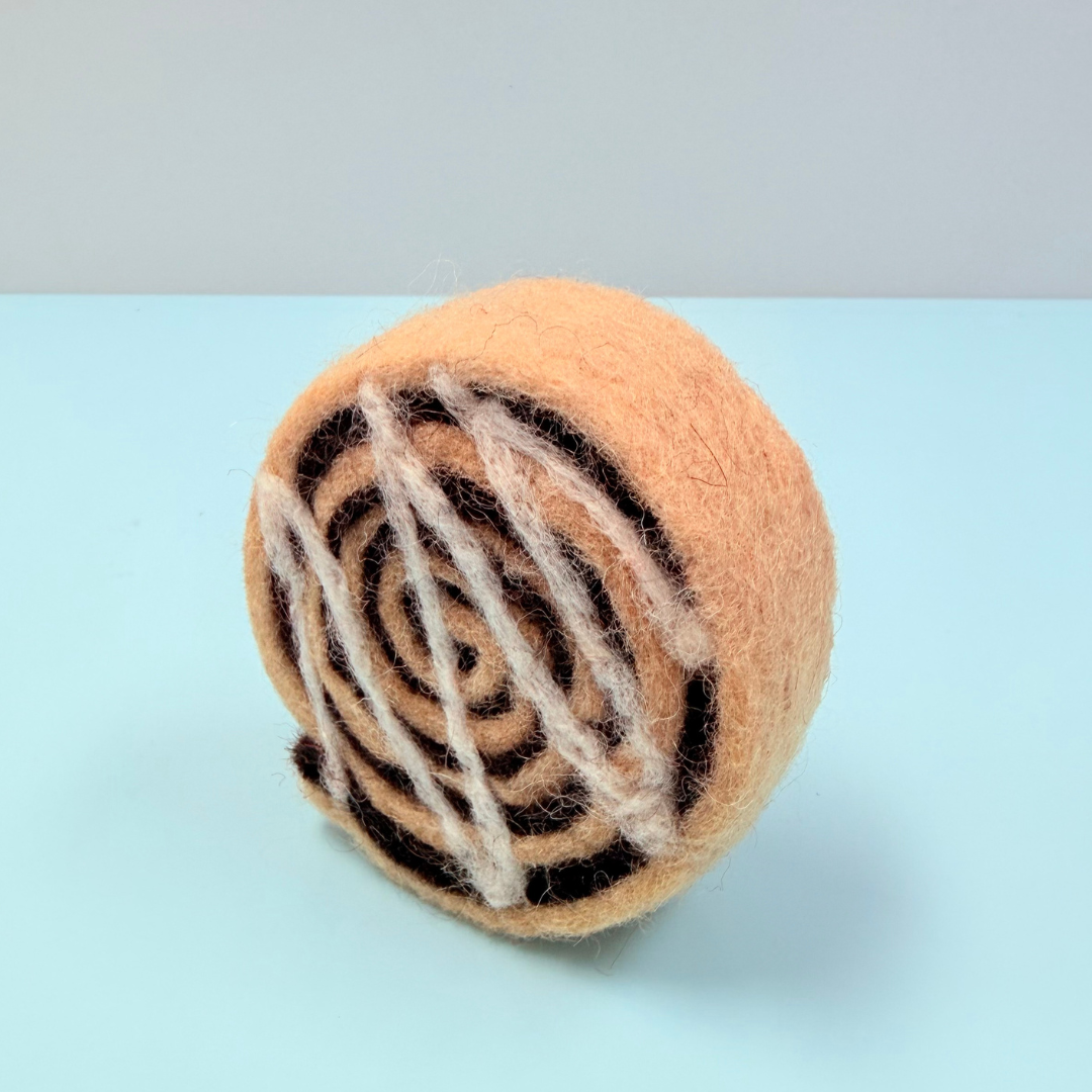 Felted soap with a spiral pattern