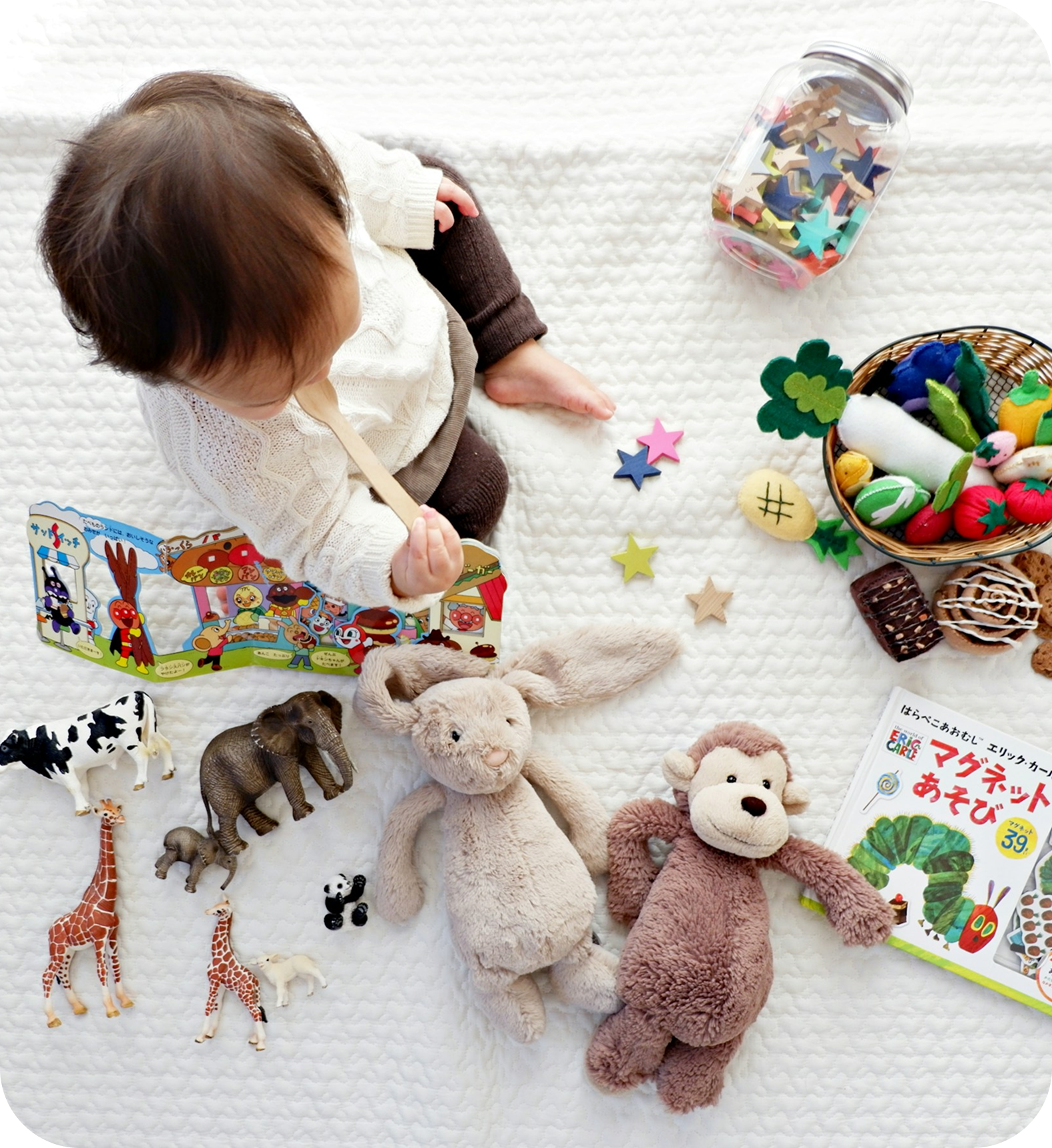 Baby playing with toys